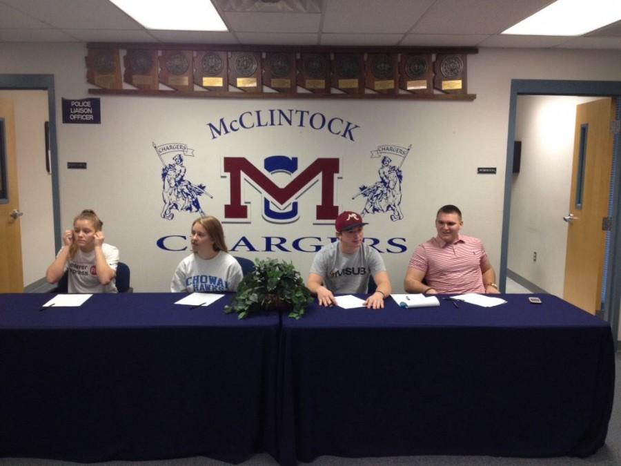 Student athletes sign to become collegiate athletes in the fall