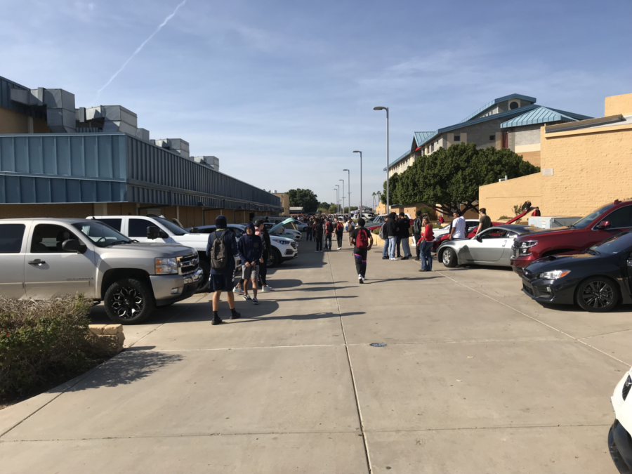 Students+and+staff+take+a+look+at+a+variety+of+cars+during+the+annual+McClintock+Dream+Car+Show.